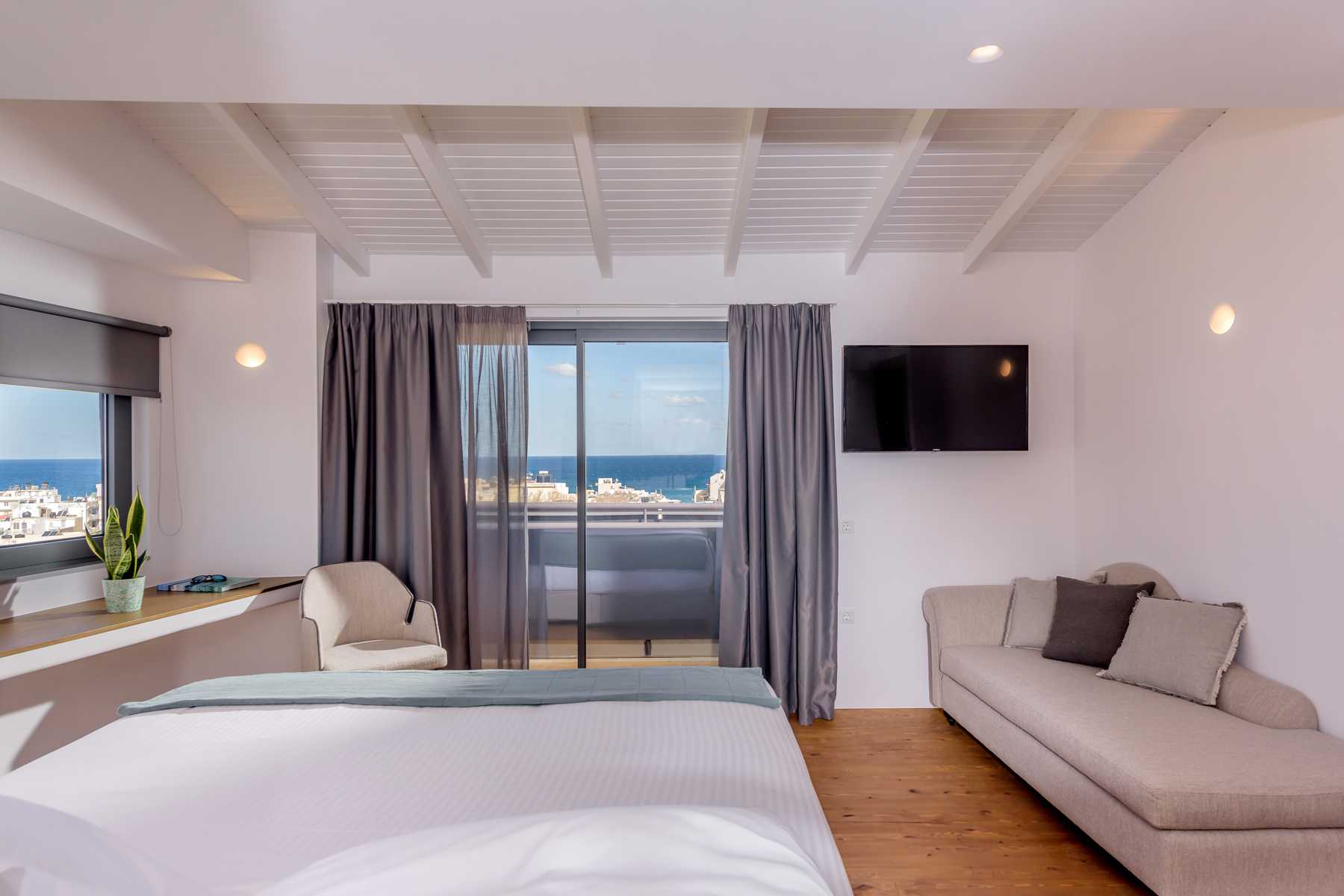 Junior Suite Bedroom and sea view